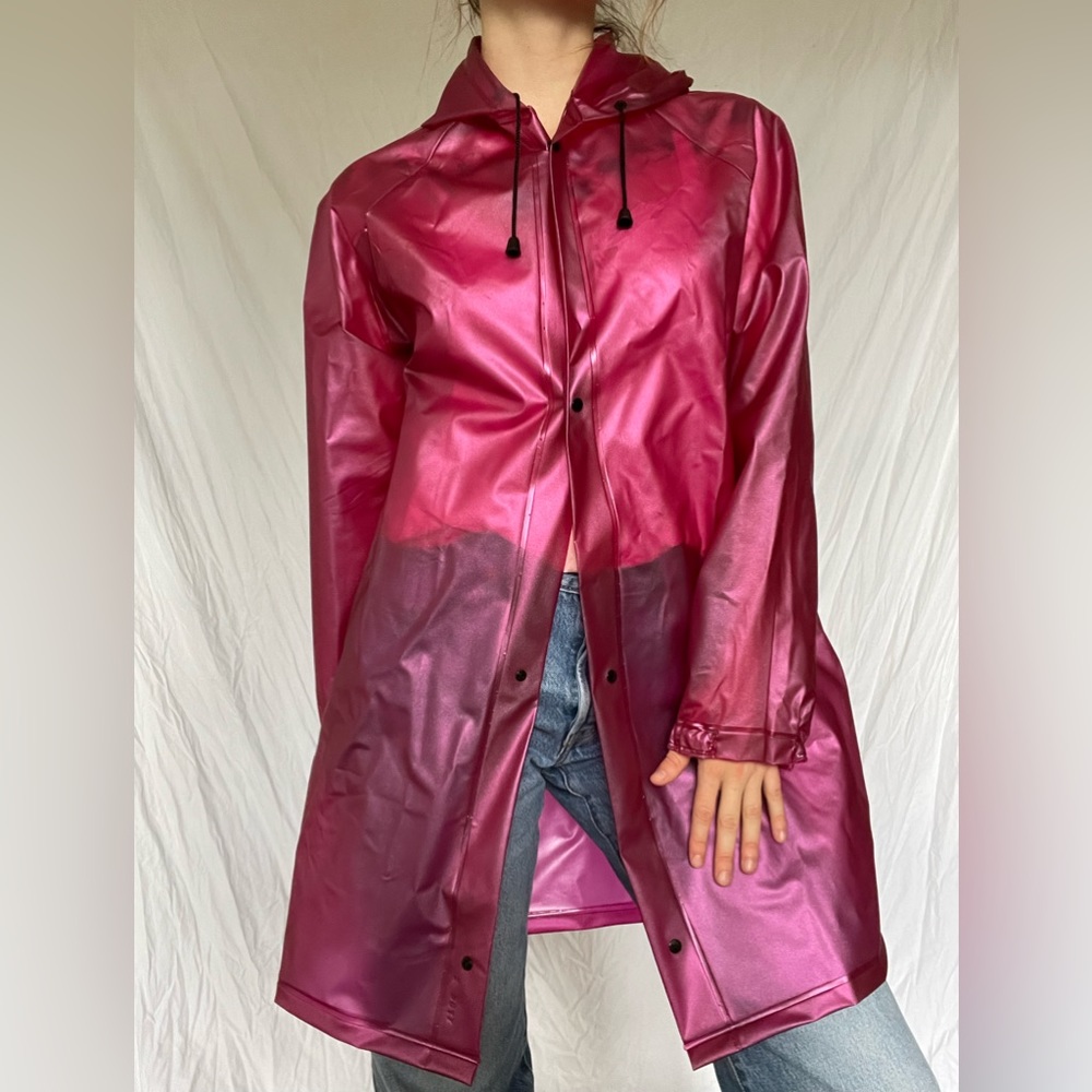 Pink sparkly translucent rain jacket